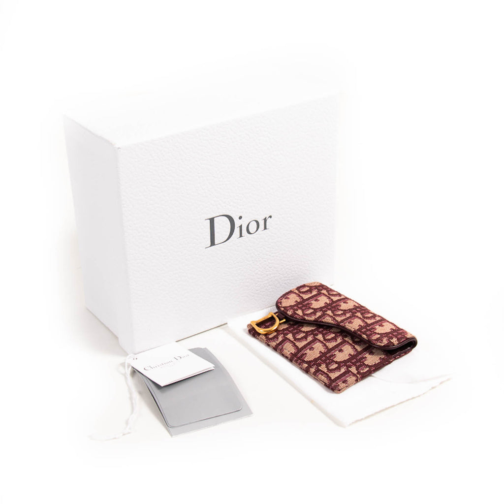 Christian Dior Saddle Compact Card Case Accessories Dior - Shop authentic new pre-owned designer brands online at Re-Vogue
