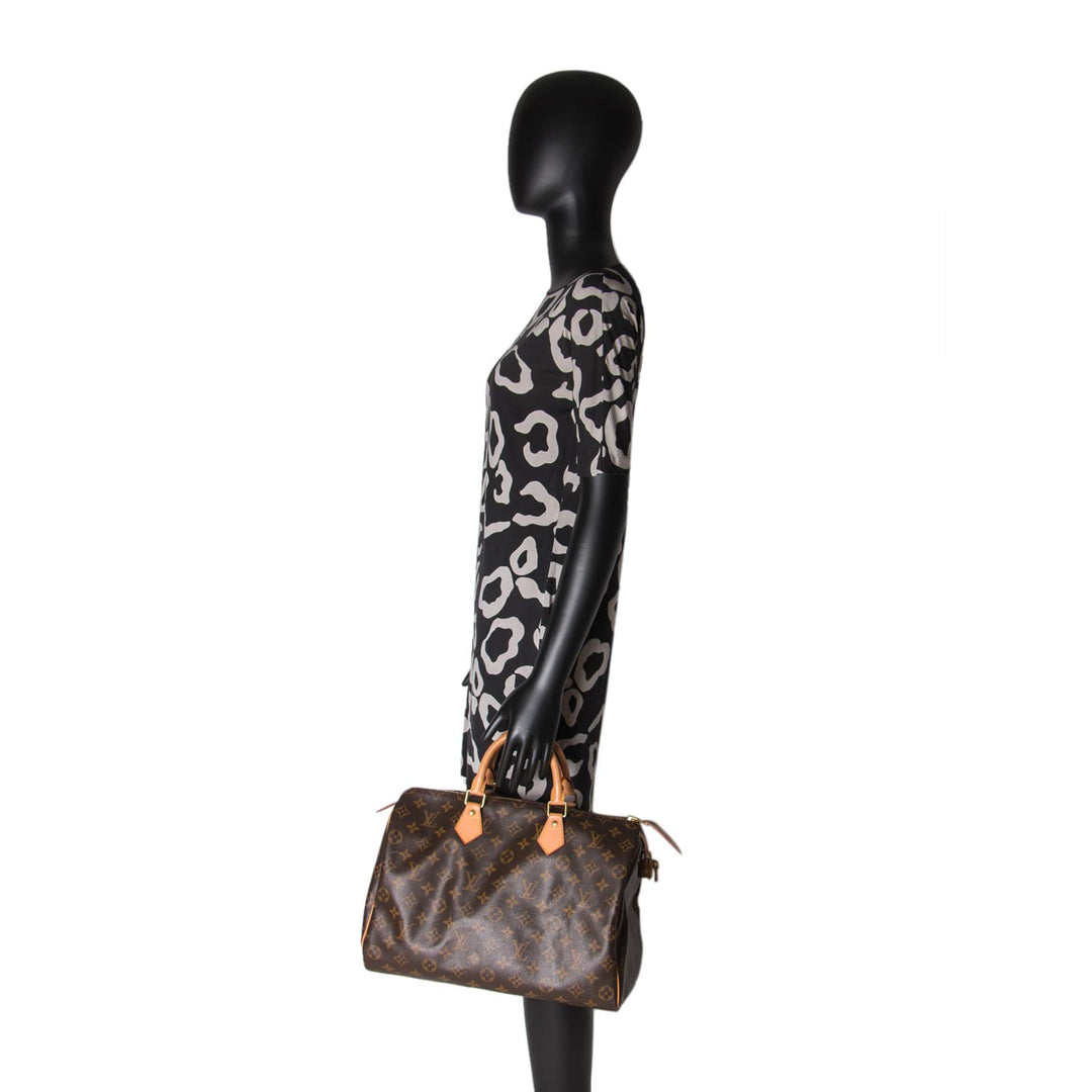 Louis Vuitton Monogram Speedy 35 Bags Louis Vuitton - Shop authentic new pre-owned designer brands online at Re-Vogue