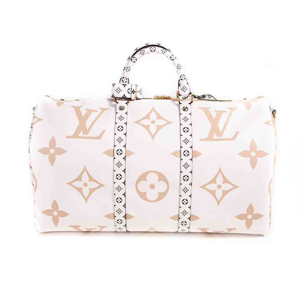 Louis Vuitton Monogram Giant Keepall Bandouliere 50 Bags Louis Vuitton - Shop authentic new pre-owned designer brands online at Re-Vogue